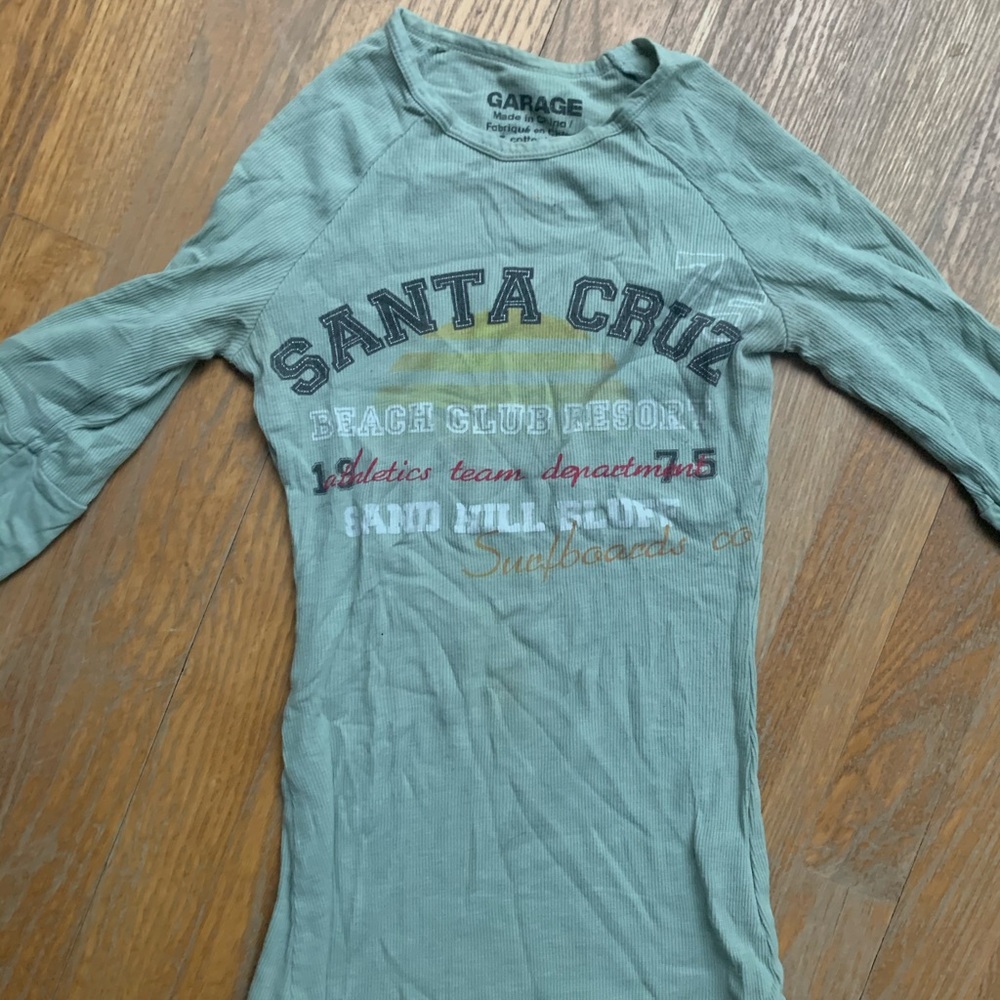Green tight half sleeve garage top